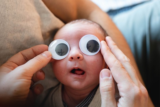 Baby with googly eyes