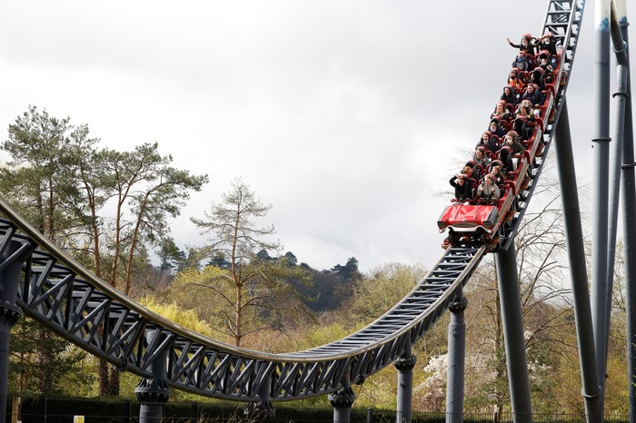 Members of the public ride on the Stealth ride at Thorpe Park theme park in Chertsey,