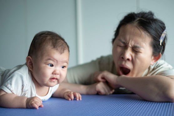 A 4-month-old baby Playing Toys with mom