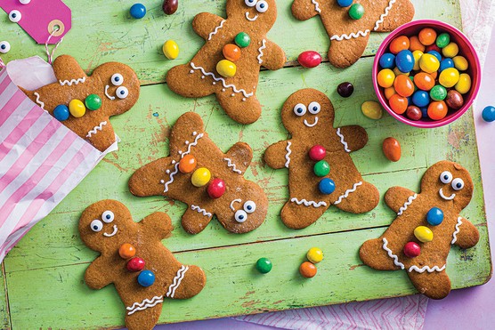 gingerbread friends cookies arranged on a board