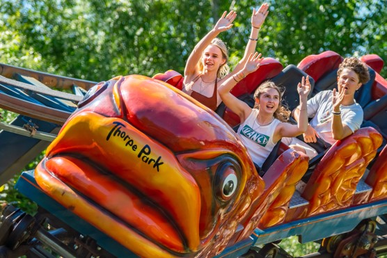 Two teenage girls enjoying Flying Fish at Thorpe Park