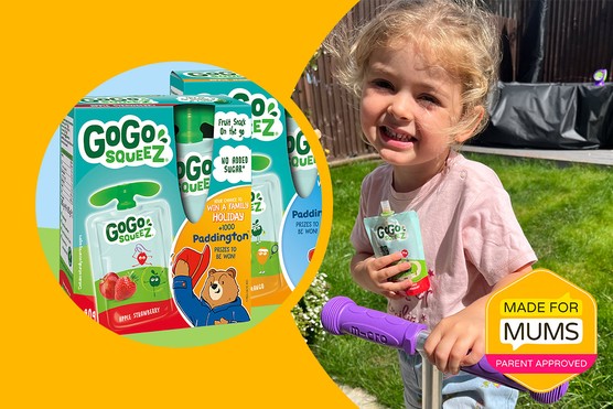 GoGo squeeZ Fruit Snack pouches - Apple Strawberry and Apple Mango | A girl holding a GoGo squeeZ Apple Strawberry Fruit Snack pouch in one hand and the other on the handlebar of a scooter