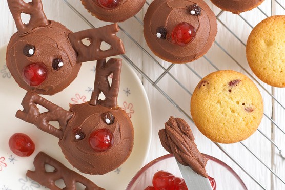 Annable Karmel's Rudolph Cupcakes on a wire rack, with some cupcakes still to be iced