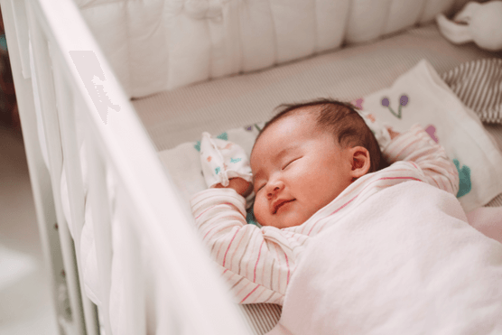 baby sleeping and smiling