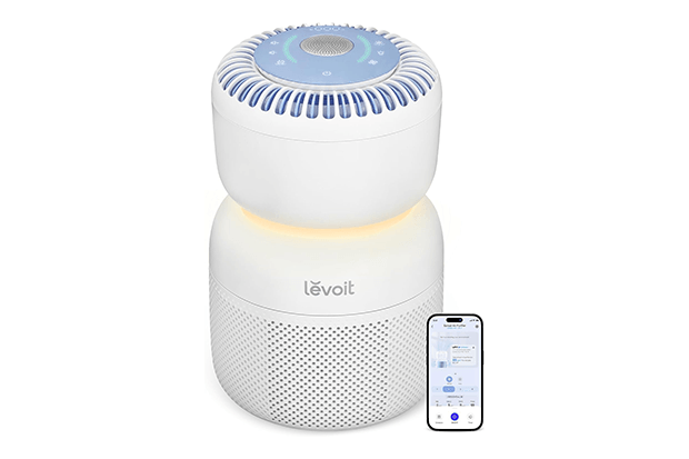 levoit sprout air purifier product overview shot with phone showing app