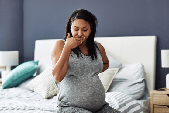 pregnant woman with morning sickness